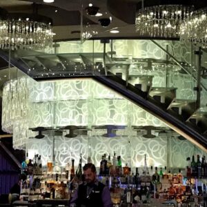 Custom Commercial Glass Etching in Las Vegas: A 30-Year Family Legacy 4 Custom etched glass installation luxury Las Vegas hotel lobby