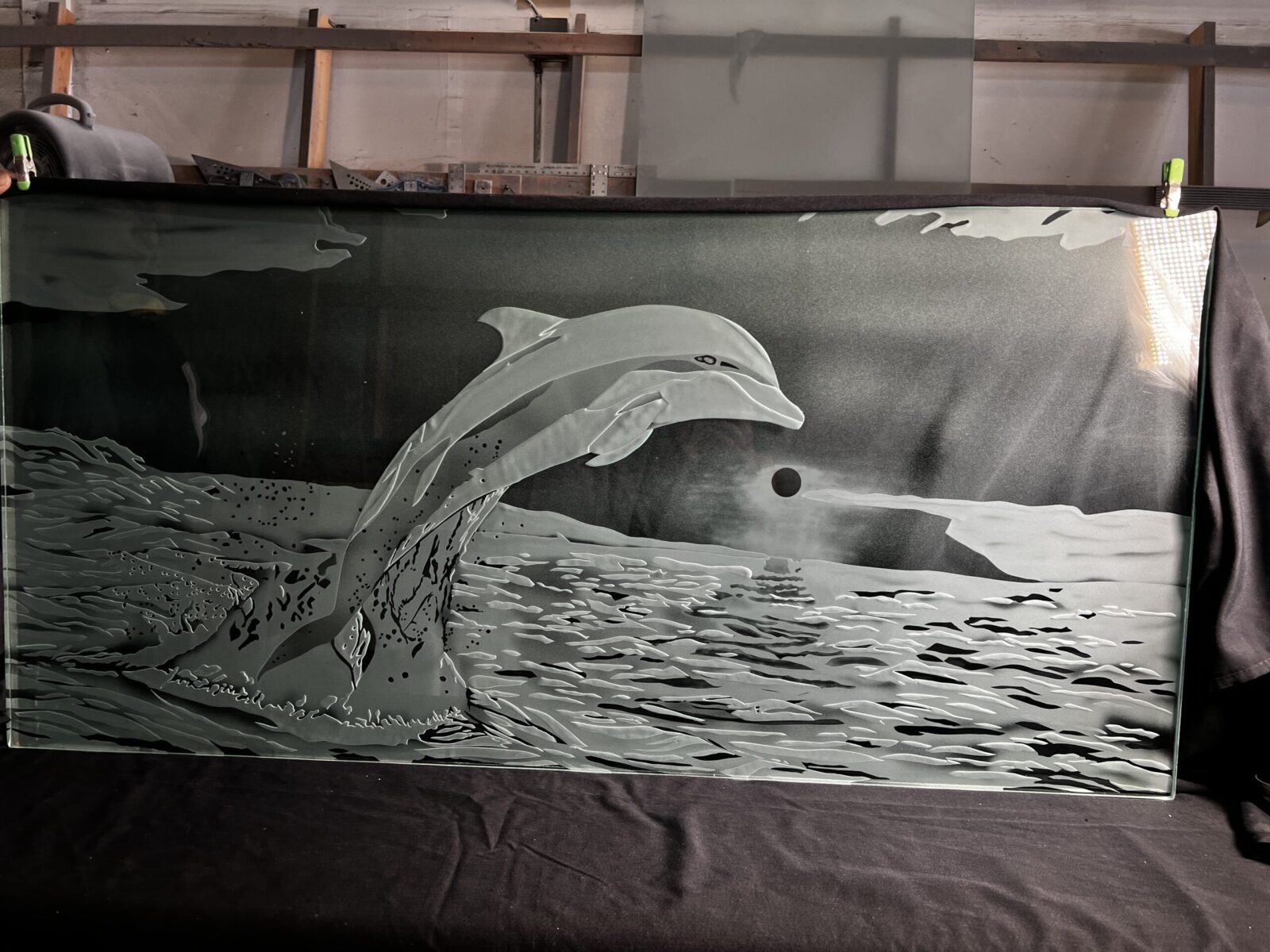 Custom etched glass gift with dolphin and sunset design